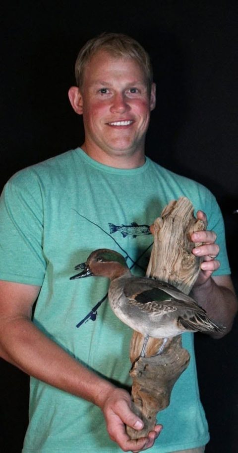 Customer with their finished mount from Jason's Taxidermy