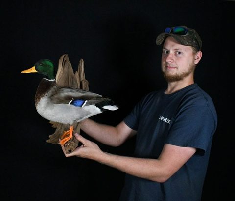 Customer with their finished mount from Jason's Taxidermy