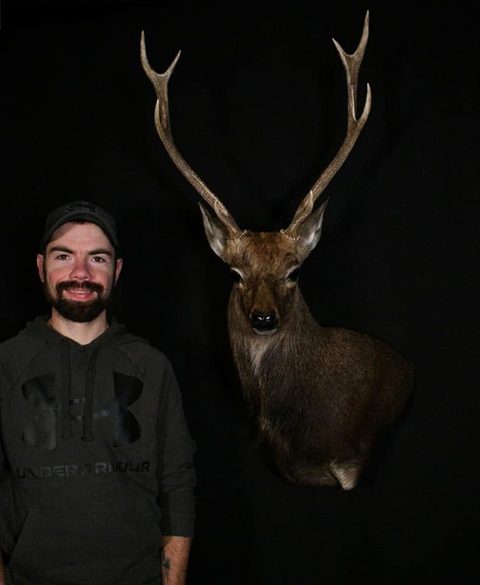 Customer with their finished mount from Jason's Taxidermy