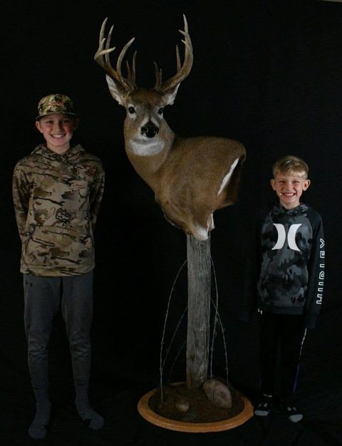 Customer with their finished mount from Jason's Taxidermy