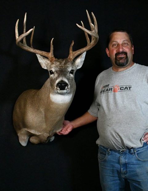 Customer with their finished mount from Jason's Taxidermy