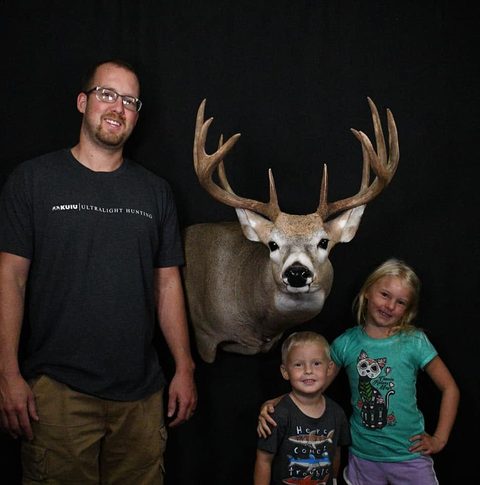 Customer with their finished mount from Jason's Taxidermy