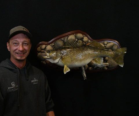 Customer with their finished mount from Jason's Taxidermy
