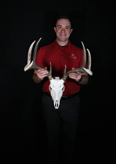 Customer with their finished mount from Jason's Taxidermy