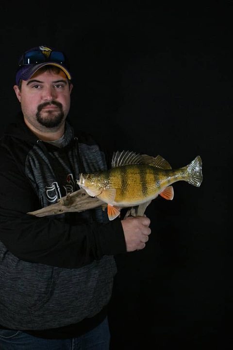 Customer with their finished mount from Jason's Taxidermy
