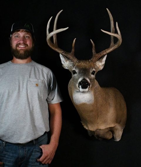 Customer with their finished mount from Jason's Taxidermy