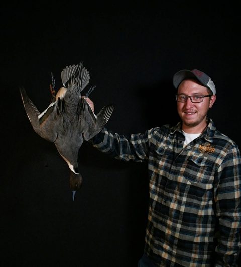 Customer with their finished mount from Jason's Taxidermy