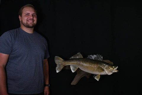 Customer with their finished mount from Jason's Taxidermy