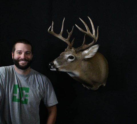 Customer with their finished mount from Jason's Taxidermy