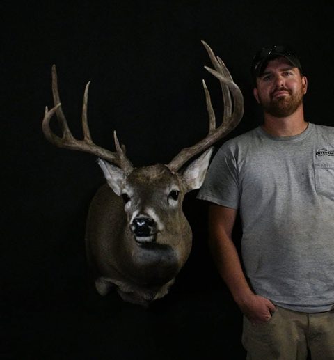 Customer with their finished mount from Jason's Taxidermy