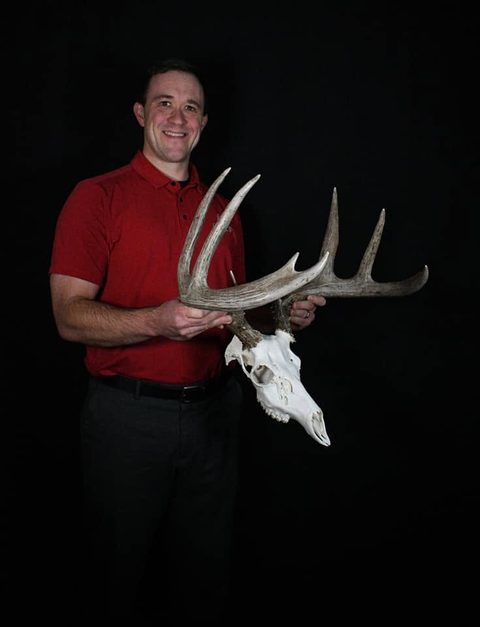 Customer with their finished mount from Jason's Taxidermy