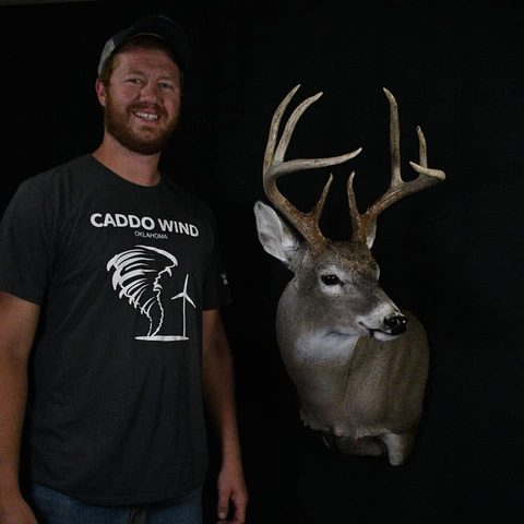 Customer with their finished mount from Jason's Taxidermy