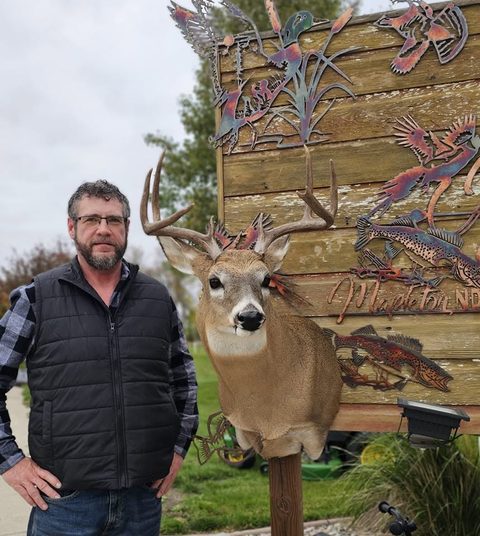 Customer with their finished mount from Jason's Taxidermy