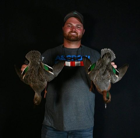 Customer with their finished mount from Jason's Taxidermy