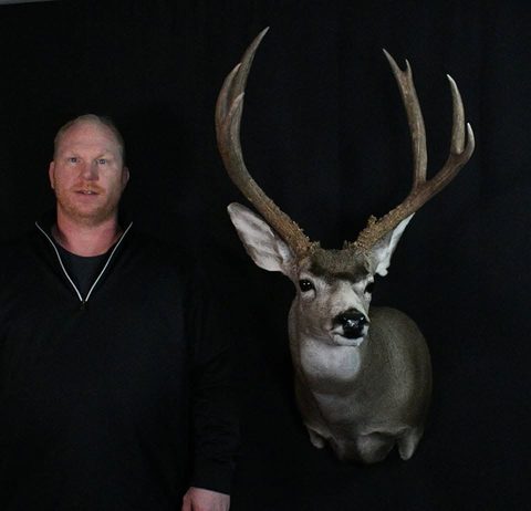 Customer with their finished mount from Jason's Taxidermy