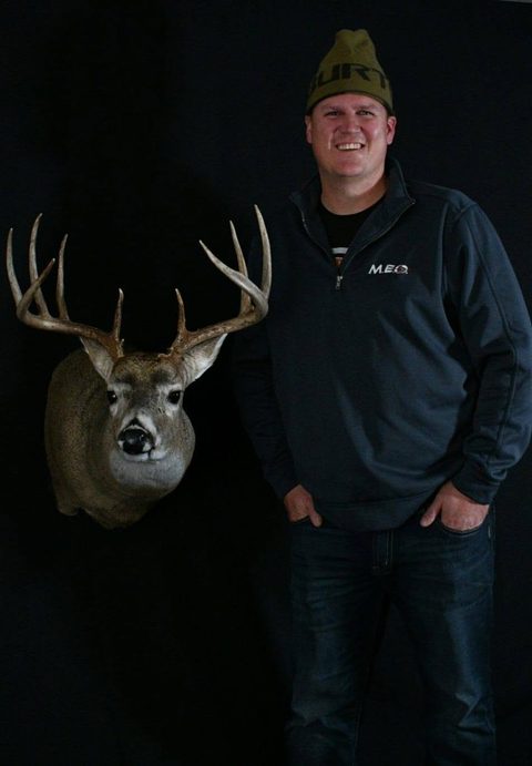 Customer with their finished mount from Jason's Taxidermy