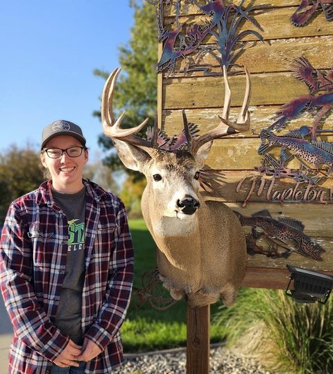Customer with their finished mount from Jason's Taxidermy