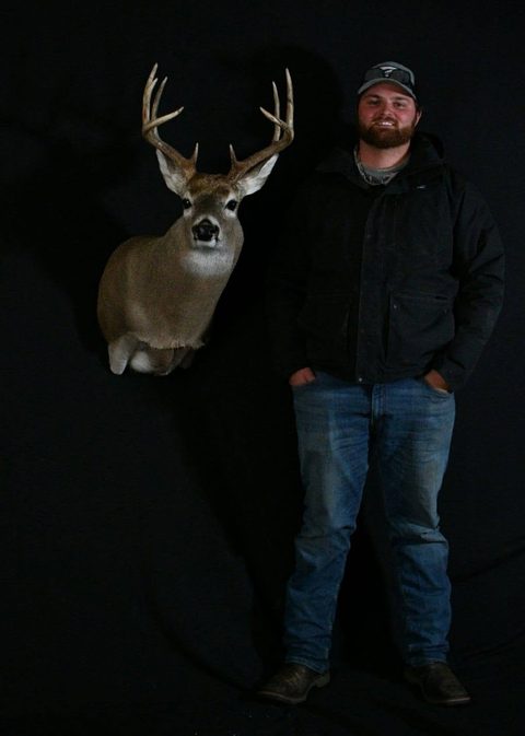 Customer with their finished mount from Jason's Taxidermy