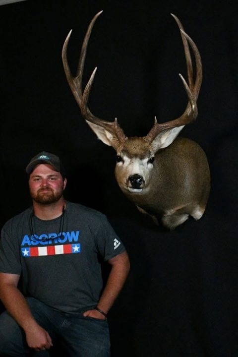 Customer with their finished mount from Jason's Taxidermy