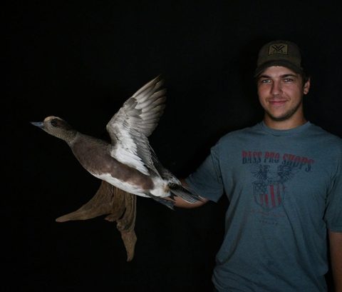Customer with their finished mount from Jason's Taxidermy