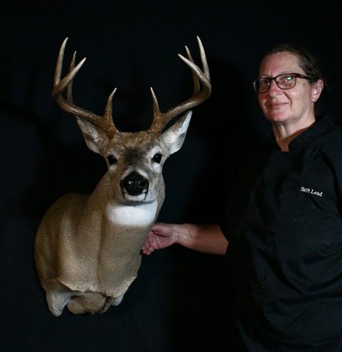 Customer with their finished mount from Jason's Taxidermy