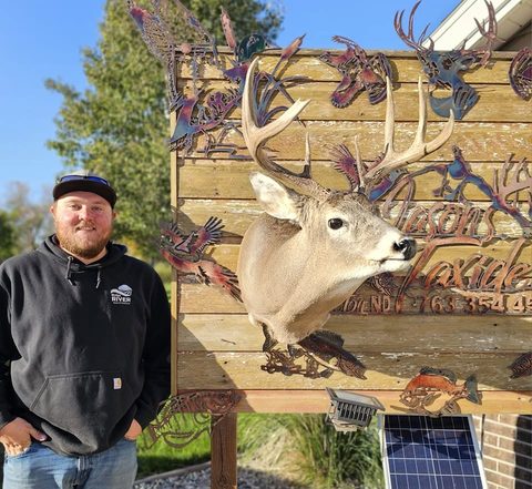 Customer with their finished mount from Jason's Taxidermy
