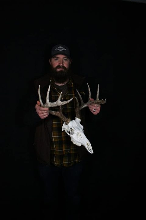 Customer with their finished mount from Jason's Taxidermy