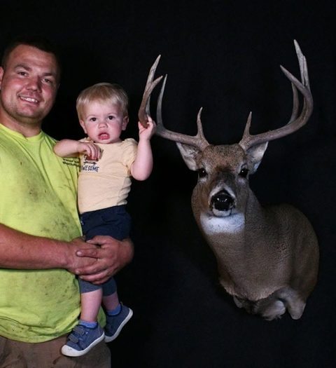 Customer with their finished mount from Jason's Taxidermy
