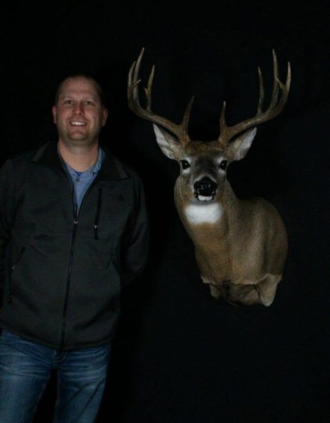 Customer with their finished mount from Jason's Taxidermy