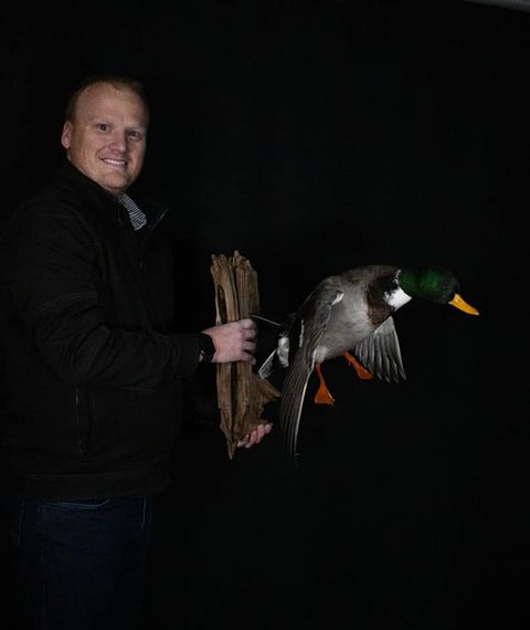 Customer with their finished mount from Jason's Taxidermy