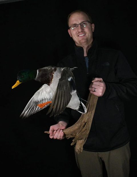 Customer with their finished mount from Jason's Taxidermy