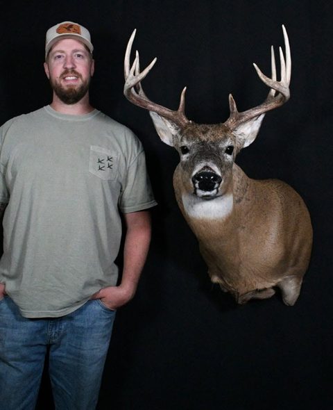 Customer with their finished mount from Jason's Taxidermy