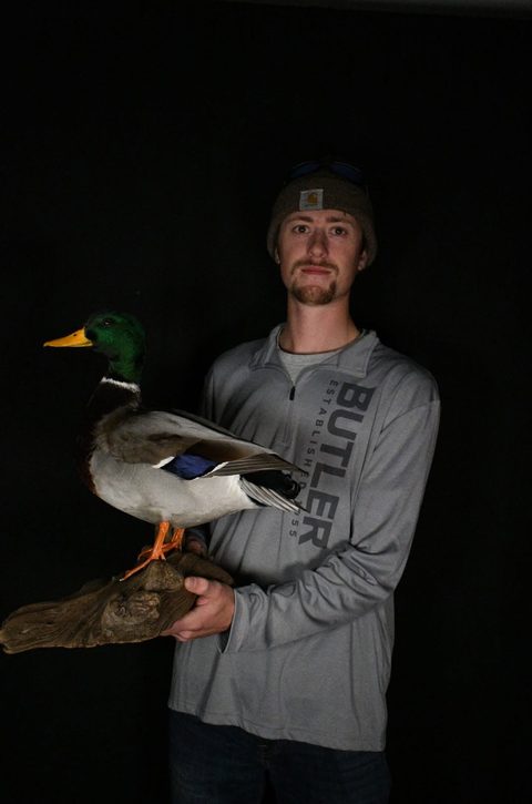 Customer with their finished mount from Jason's Taxidermy