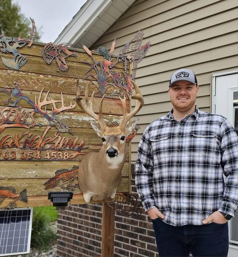 Customer with their finished mount from Jason's Taxidermy