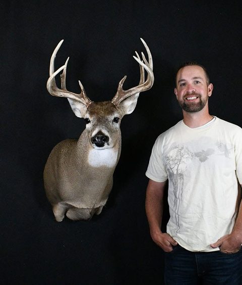 Customer with their finished mount from Jason's Taxidermy