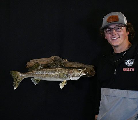 Customer with their finished mount from Jason's Taxidermy