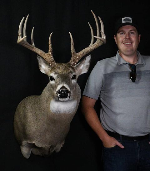 Customer with their finished mount from Jason's Taxidermy