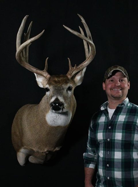 Customer with their finished mount from Jason's Taxidermy