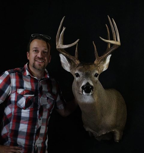Customer with their finished mount from Jason's Taxidermy
