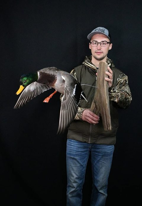Customer with their finished mount from Jason's Taxidermy