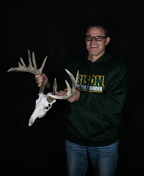 Customer with their finished mount from Jason's Taxidermy