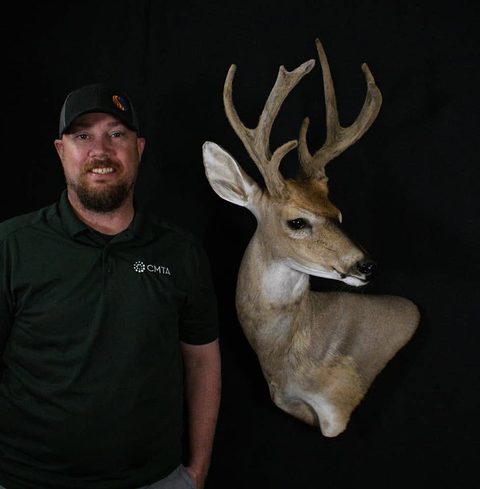 Customer with their finished mount from Jason's Taxidermy