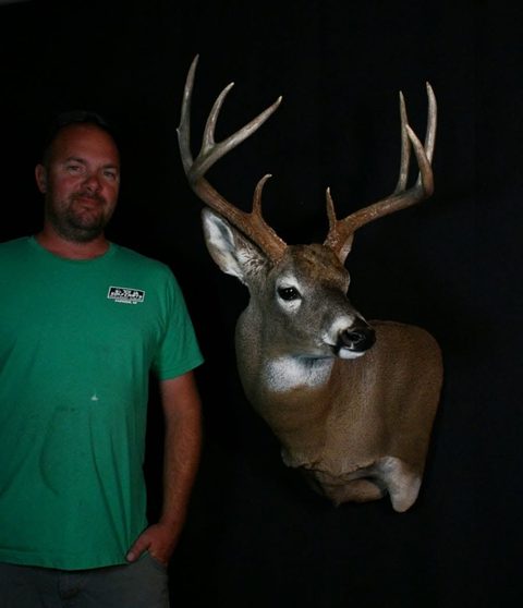 Customer with their finished mount from Jason's Taxidermy