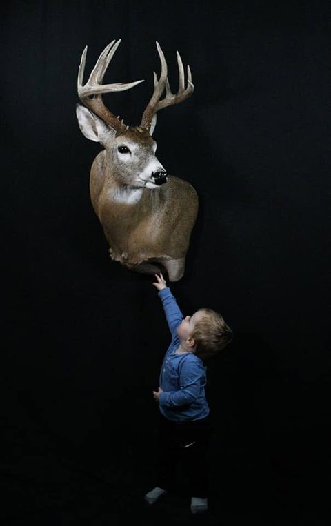 Customer with their finished mount from Jason's Taxidermy