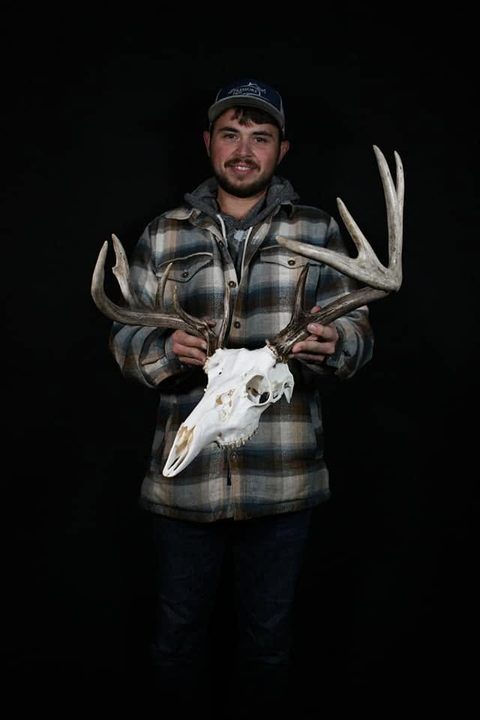 Customer with their finished mount from Jason's Taxidermy