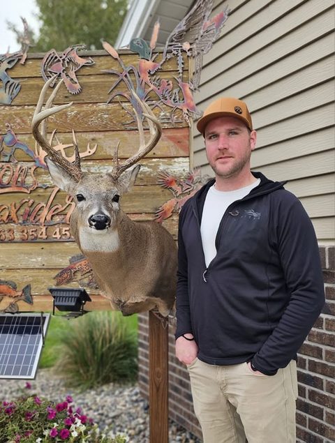 Customer with their finished mount from Jason's Taxidermy