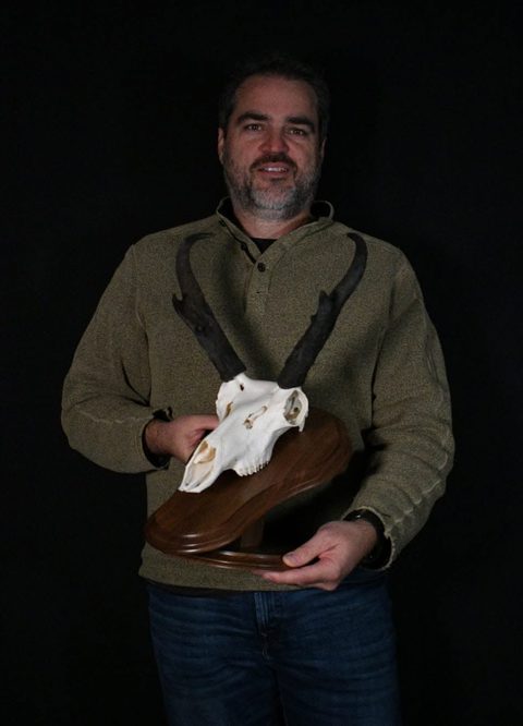 Customer with their finished mount from Jason's Taxidermy