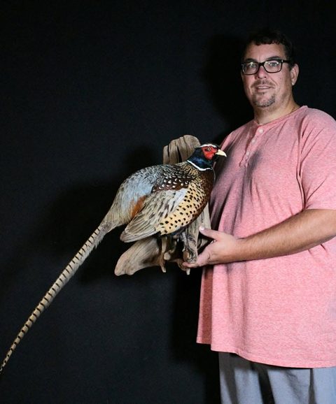 Customer with their finished mount from Jason's Taxidermy