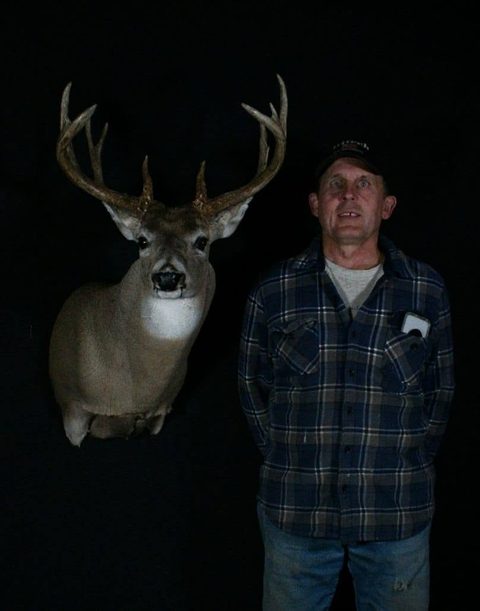 Customer with their finished mount from Jason's Taxidermy