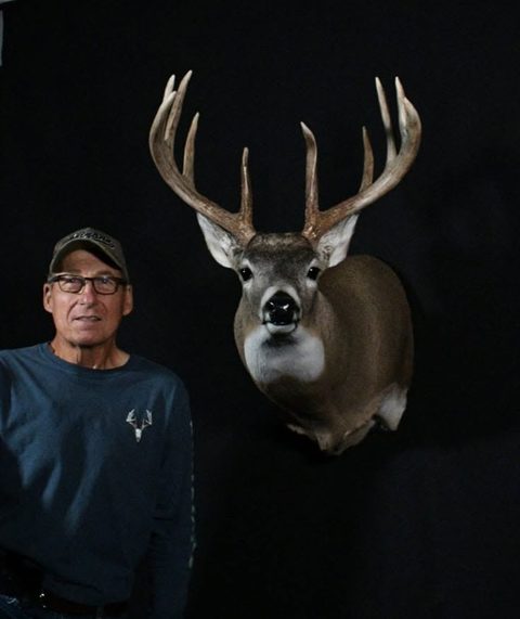 Customer with their finished mount from Jason's Taxidermy